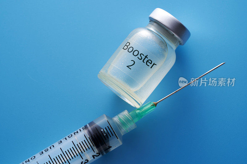 蓝色背景的Covid - 19疫苗